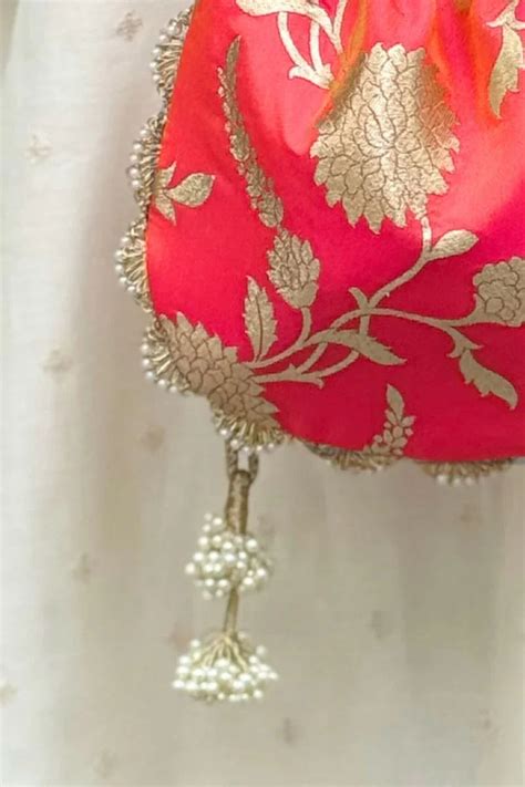 Buy AMYRA Satrangi Banarasi potli - Coral Pink online - The AMYRA Store