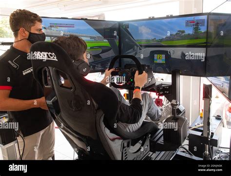 Image result for Man Driving a Racing Simulator