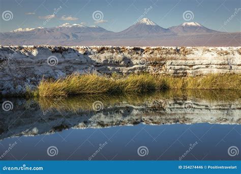 Volcanic Landscape and Salt Lake Reflection at Sunset in Atacama Desert ...