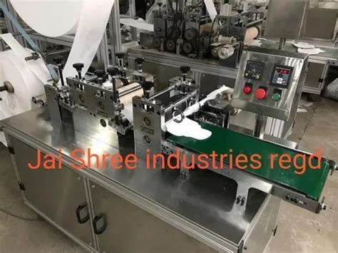 Sanitary Napkin Making Machine - Sanitary Napkin Glue Attach Automatic ...