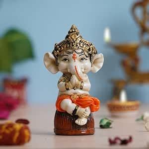 Buy eCraftIndia Orange Polyresin Handcrafted Lord Ganesha Idol Sitting ...