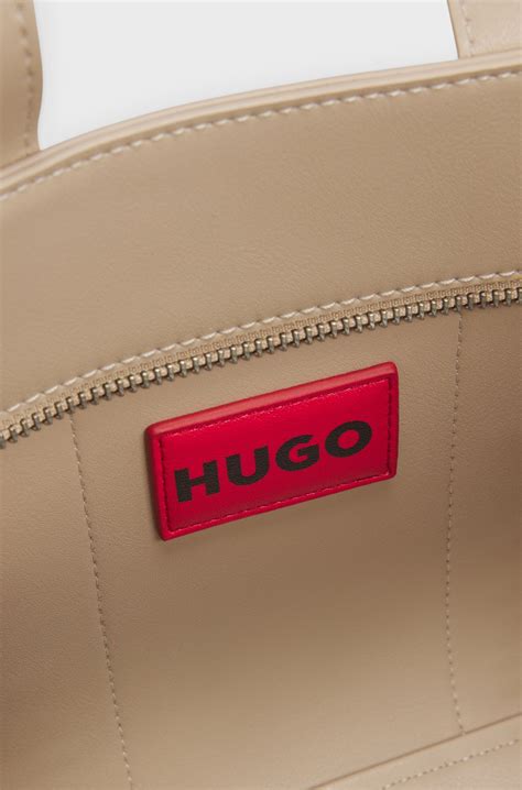 HUGO - Faux-leather mini tote bag with embroidered logos - Light Beige