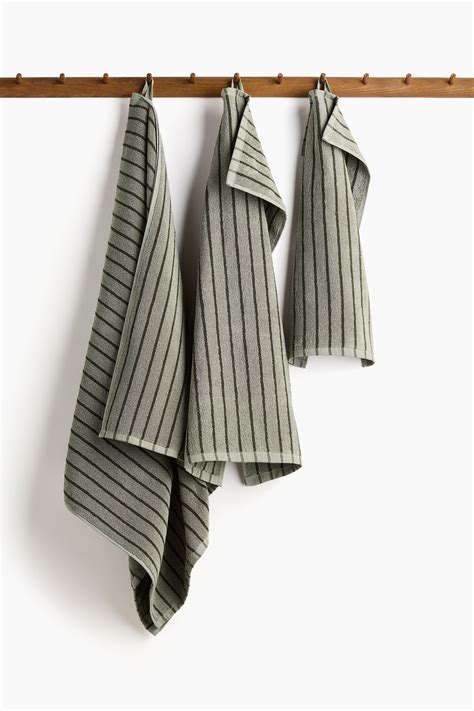Striped hand towel - Sage green/Black striped - Home All | H&M IN