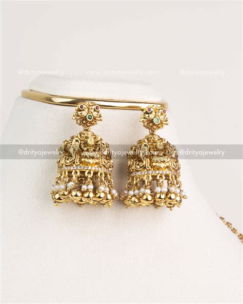 Premium Temple Jhumka Earrings with Nakshi Detailing – Dritya Jewelry