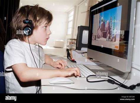 Boy Playing Computer Clip 的图像结果