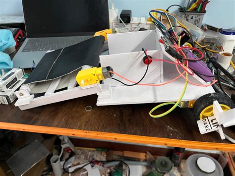 Autonomous River Cleaning Robot Using Conveyor Mechanism | SPS PROJECT HUB