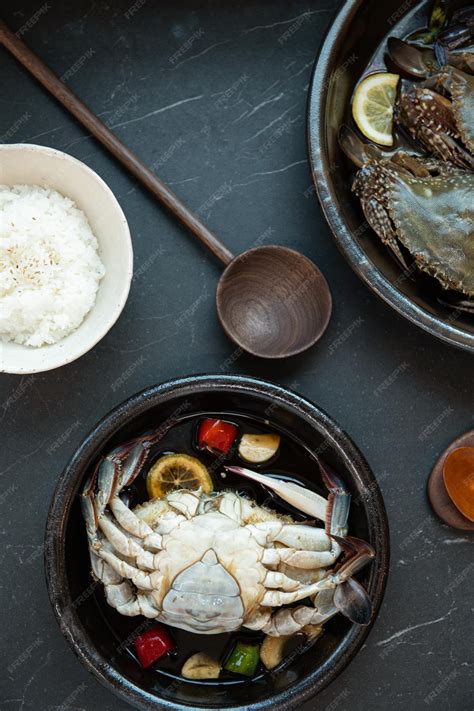 Premium Photo | Soy sauce marinated crab on the table