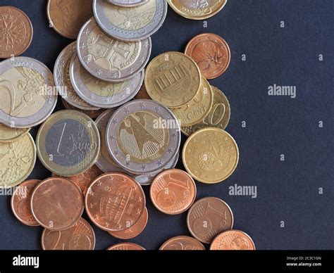 Euro coins money (EUR), currency of European Union over black background Stock Photo - Alamy