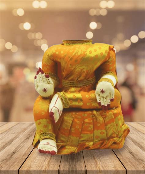 Varamahalakshmi Idol With Orange And Gold Saree – PujaNpujari