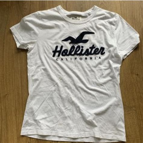 white hollister logo t-shirt. women’s size xs but... - Depop