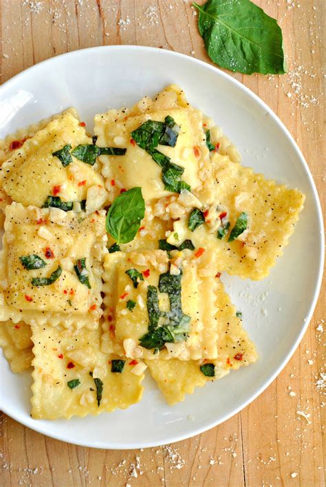 Creamy cheese ravioli sauteed in a light sauce of garlic and basil ...