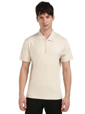 Buy Calvin Klein Jeans Men Cream Solid Half Zipper Polo T-Shirt (2XL ...