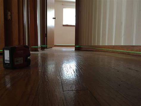 How To Fix Sloping Floors In An Old House - Ohio Basement Authority