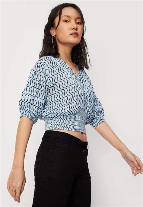 Buy Women Printed Blouson Crop Top Online at just Rs. 599.0 ...
