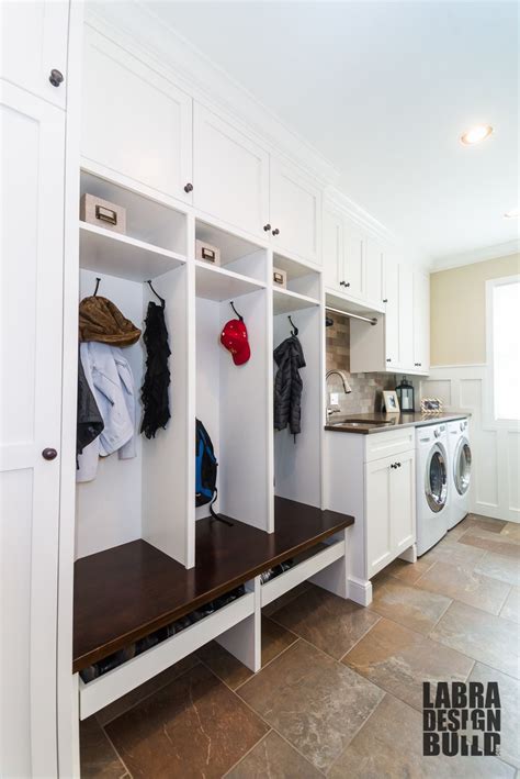 Laundry + Mudroom Combo with Custom Cabinetry and Wainscoting by Labra ...
