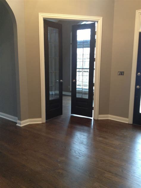 Dark Floors and Black Doors: A Stylish Home Decor Idea
