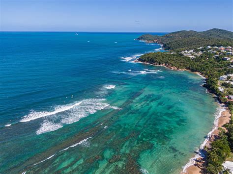 Surfers on Tartane surf spots, Caravelle peninsula, Martinique, West ...