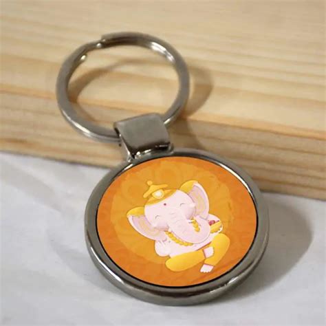 Order Sitting Bala Ganesha Round Metal Keychain online at lowest prices ...