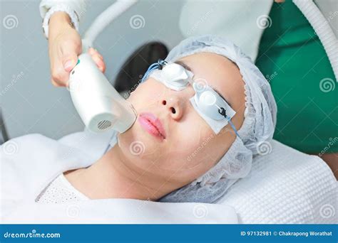 Close-up of Beautician Giving Laser Epilation Treatment To Young Stock Image - Image of facial ...