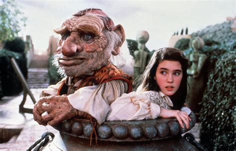 the wizard and the bride are sitting in a pot with their heads turned ...