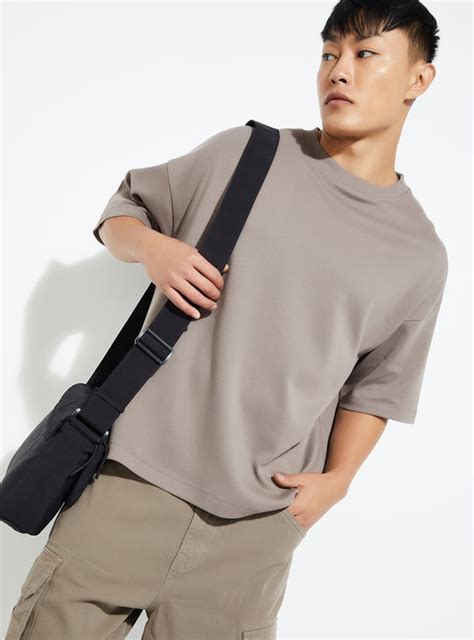 Buy URB_N Men Solid Boxy Fit T-shirt Online at just Rs. 499.0 ...