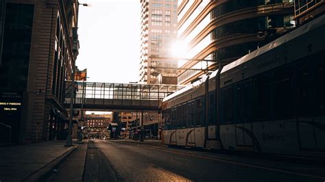 Wallpaper road, buildings, train, city, rays hd, picture, image
