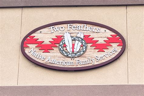 Two Feathers Native American Family Services logo