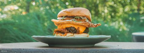 Burgers and Cash Voucher at Park Bench Deli in Telok Ayer - Klook India ...