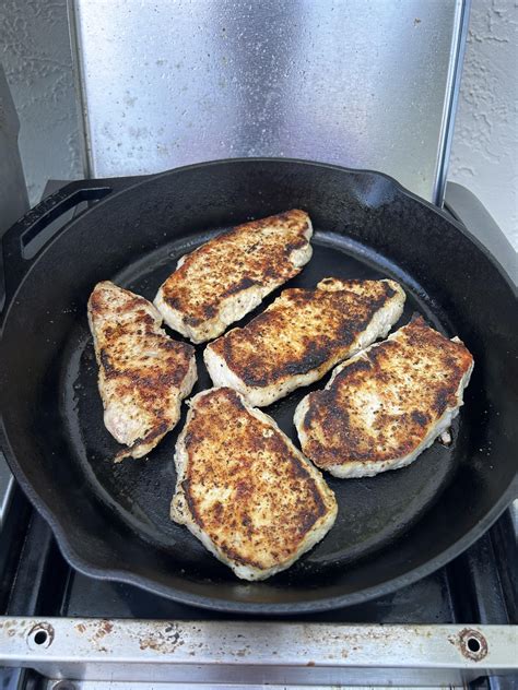 1st time frying pork chops. Low heat, olive oil, and Webber Grill dry ...