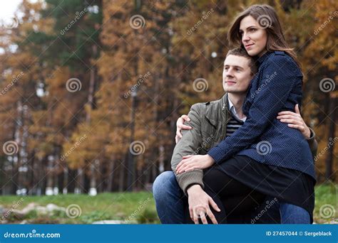 Girl sitting on lap men stock photo. Image of green, relations - 27457044