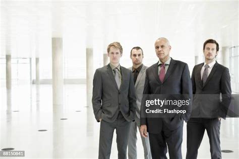 Group of Men in Suits 的图像结果