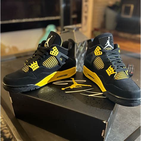 Air Jordan 4's Retro Yellow and Black