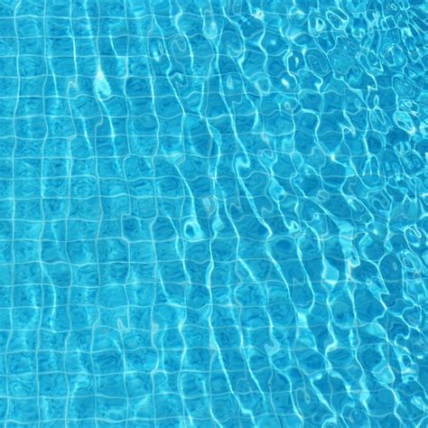 Blue rippled water background in swimming pool | Free Photo