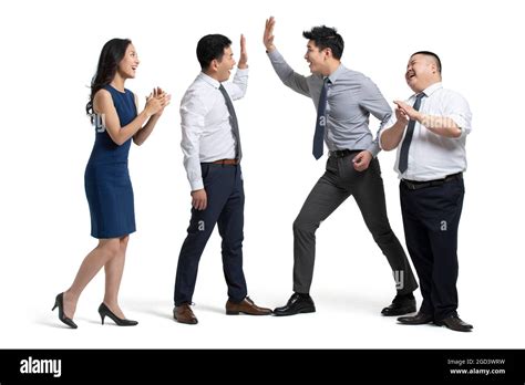 Multi Etnich Group of Business People Celebrating Together 的图像结果