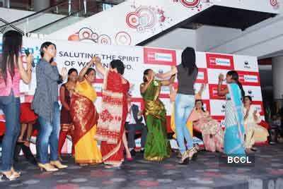 Arjun Rampal and Neetu Chandra cut a cake during the Women's Day ...