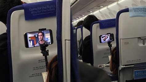 'Jugaad Ka Ant Nahi': Woman Uses Tripod To Watch Series On Flight Seat ...