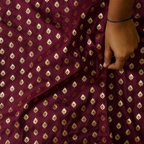 Soft Banarasi Brocade Maroon With Golden Zari Butti Fabric – Sanskruti