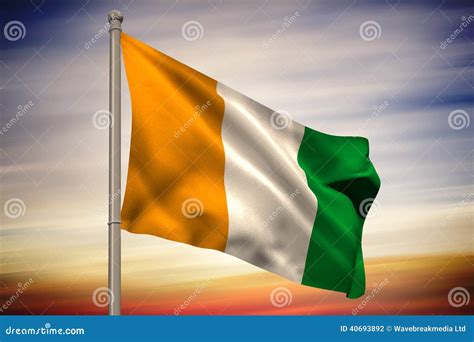 Ivory Coast National Flag on Flagpole Stock Photo - Image of flag ...