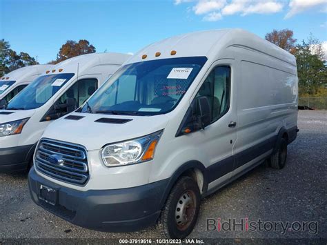 Report 1FTBF4XG5JKA95467 FORD TRANSIT VAN 2018 White Gasoline - price and damage history