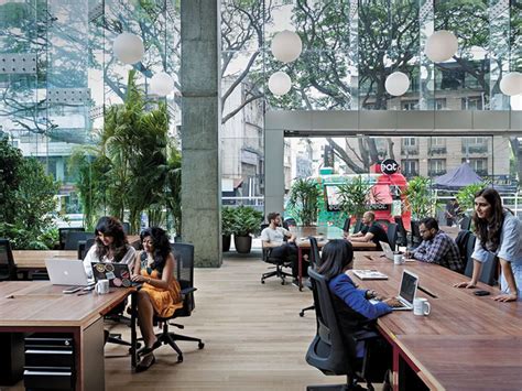A desk away from the office: Why India Inc is checking into co-working ...