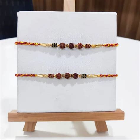 Send Set of 2 Spiritual Rudraksha Rakhi Online | Rakhibazaar.com