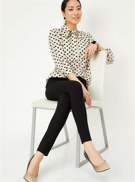 Buy Women Solid Button Accent Treggings Online at just Rs. 999.0 ...