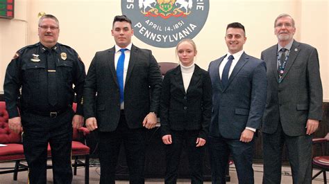 Erie police swear in three new officers to join the 186-member force