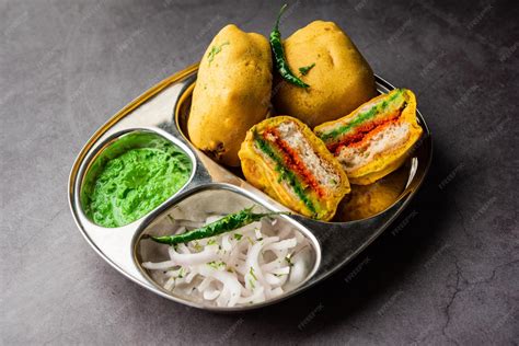 Ulta vada pav is made with a spicy potato stuffed bun called pav inside ...