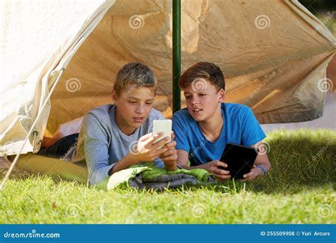 Whoa, Thats so Cool. a Young Boy Showing His Friend Something on a ...