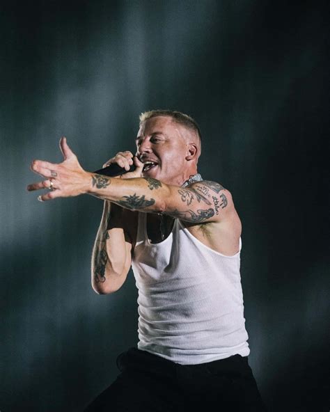 Download Macklemore Performing Live Onstage.jpg Wallpaper | Wallpapers.com
