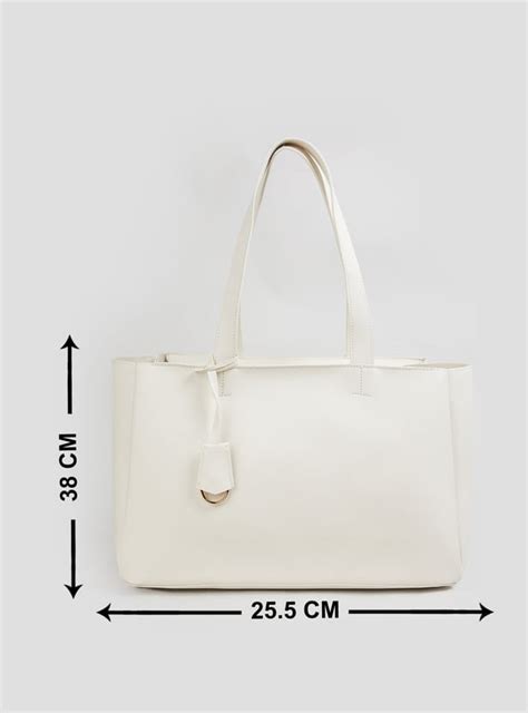 Buy Women Textured Tote Bag Online at just Rs. 1299.0 - 1000015217375 ...