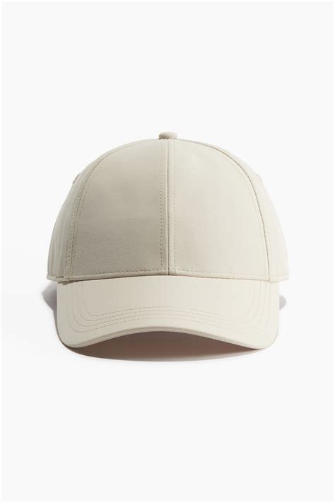 Water-repellent sports cap - Light beige - Ladies | H&M IN