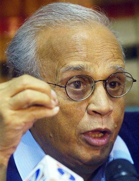 Justice Fakhruddin Ibrahim, announces the decision to overturn the ban ...