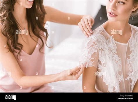 Image result for Bridesmaid Helping Bride